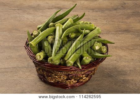 Okra On Wooden Background