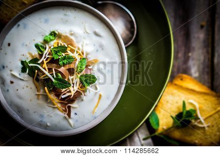 Cream Soup With Bread And Meat On Wooden Background
