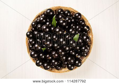 Berry Jaboticaba In Bowl On Wooden Table