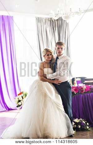 Happy bride and groom on their  wedding reception