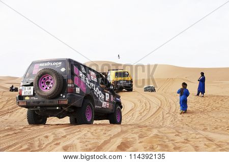 ERG CHIGAGA, SAHARA DESERT, MOROCCO, OCTOBER 24 2015: All wheel drive vehicles at a rally in Shara Desert, Morocco, Africa
