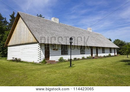 Big wooden hut in museum in Tokarnia, Poland