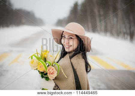 Winter portrait of a young woman