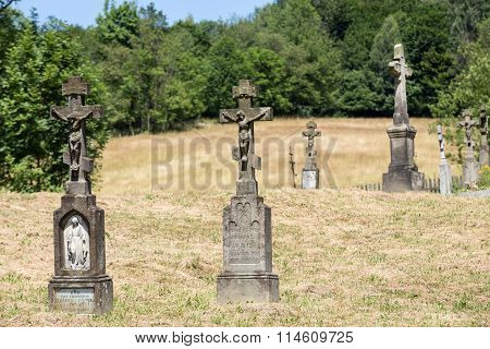 BARTNE POLAND - JULY 11 2015: Old abandoned stony Orthodox crosses in Bartne. Poland