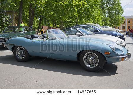 Blue Jaguar E-type Roadster (OTS) Series 2, a side view. Exhibition-parade of sports cars. Turku, Fi