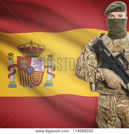 Soldier Holding Machine Gun With Flag On Background Series - Spain