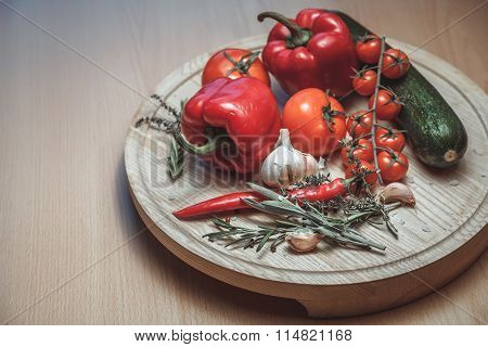 Fresh Vegetables. Top View Of Red Ripe Tomatoes And Cucumber On Wooden Table.