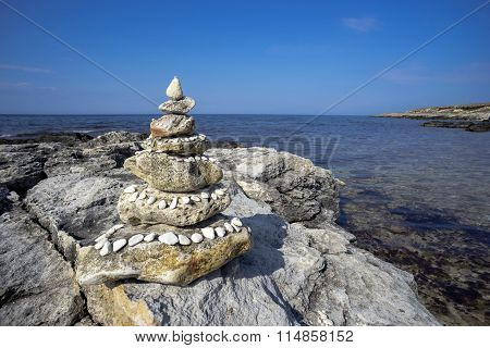 Stone Pyramid On The Beach.