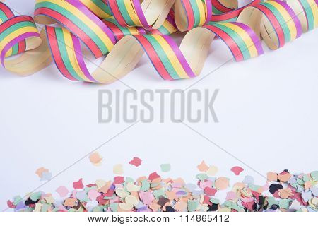 Streamers And Confetti For Carnival On White Background