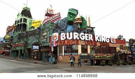 NIAGARA FALLS, CANADA-JANUARY 11, 2016:  Burger king restaurant in Niagara falls with Frankenstein eating a whopper burger on top.