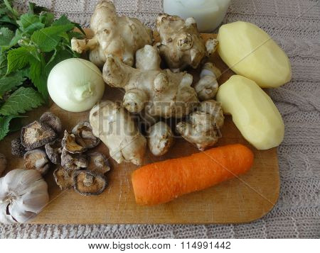 Cooking artishok white-nettle mushrooms gratin