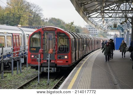 Ealing, London. 15th November 2017. A central line train is at the platform waiting for an eastbound departure.
