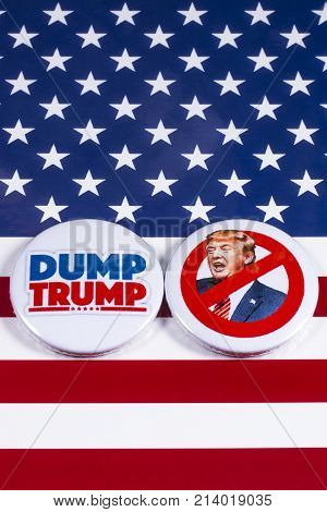 LONDON UK - NOVEMBER 15TH 2017: Anti-Tump badges over an American flag background on 15th November 2017.