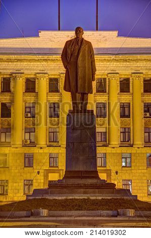 Penza, Russia - August 08, 2016: Lenin monument on background of the building of the Government of Penza region.