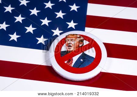 LONDON UK - NOVEMBER 15TH 2017: Anti-Tump badge over an American flag background on 15th November 2017.