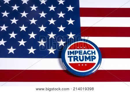 LONDON UK - NOVEMBER 15TH 2017: Anti-Tump badge over an American flag background on 15th November 2017.