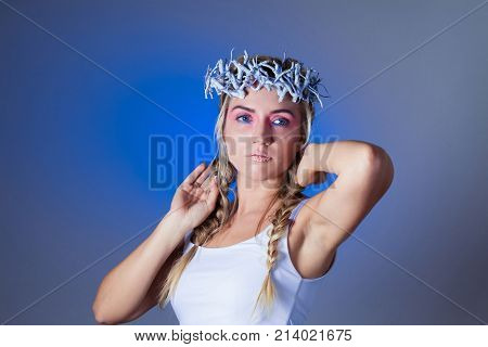 Fantasy winter queen from fairytale forest, ice makeup