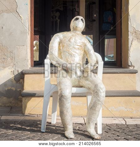Mummy sitting in the street. Funny situation on the road