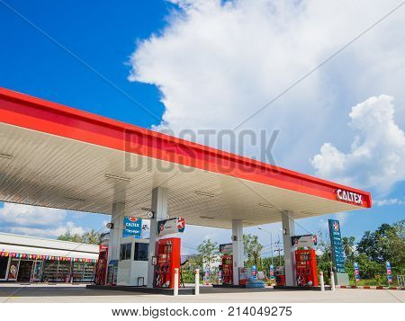 Trang Thailand - September 2 2017: Caltex gas station blue sky background. Caltex is a petroleum brand name of Chevron Corporation used in more than 60 countries.