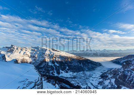 Leukerbad Switzerland view from Gemmipass evening sun sea of fog winter snow