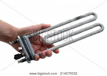 Hand holding washing machine heater isolated on a white background