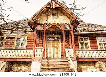 Traditional old house in Zdiar village Slovak republic. Travel destination. Yellow photo filter.