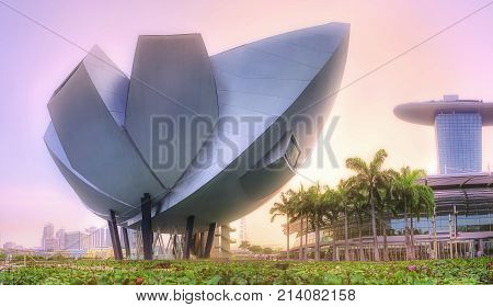 SINGAPORE CITY, SINGAPORE: APRIL 17, 2017: Sunrise at business bay and Singapore city skyline with Singapore museum