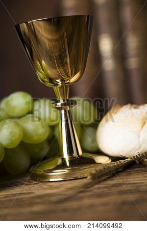 Eucharist symbol of bread and wine, chalice and host, First communion background