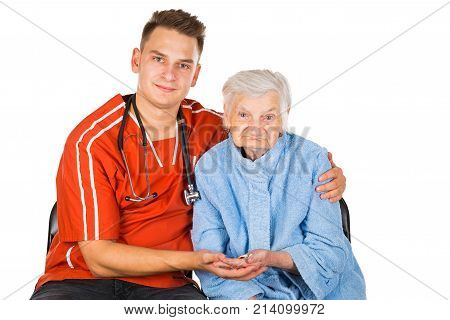 Picture of a senior woman with her young male caregiver