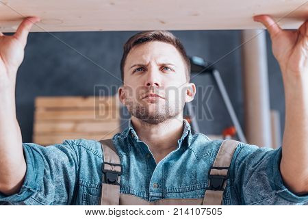 Handyman Installing Self-assembly Furniture
