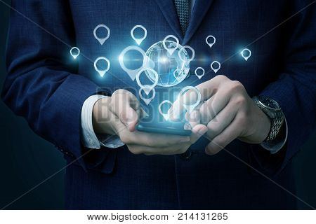 Businessman Defines The Location On The Tablet .