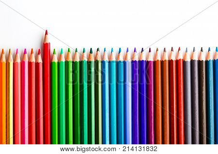 Leadership Concept With One Pencil Standing Out Of Crowd Of Other Pencils