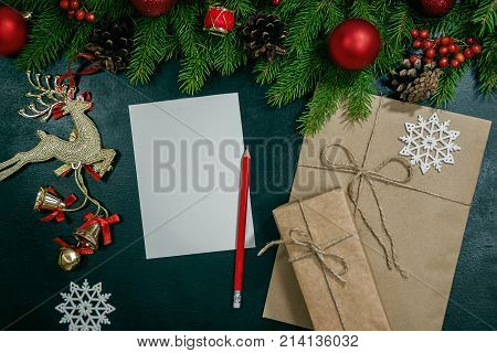 Christmas Background Or Xmas Card  With Decorations Fir, Gift Box And Ornamen. Space For Holiday Gre