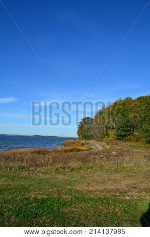 Beautiful photo in Worlds end park of the land meeting the ocean in Hingham