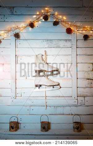Vintage skates on the wall as a New Year's decor