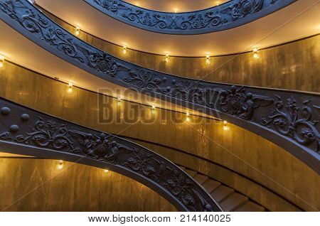 VATICAN CITY - SEPTEMBER 27: The unique staircase built by Bramante inside the Vatican Museum on September 27 2014 in Vatican City