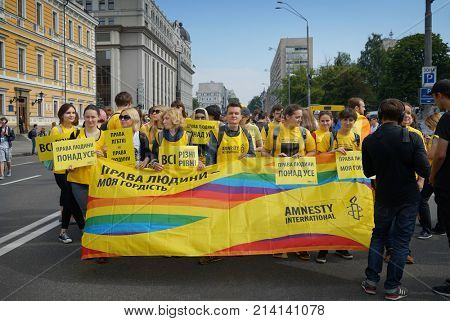 KYIV, UKRAINE - JUNE 18, 2017: Activists holding agitative posters on gay pride