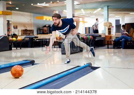 Friends having fun while bowling and speding time together