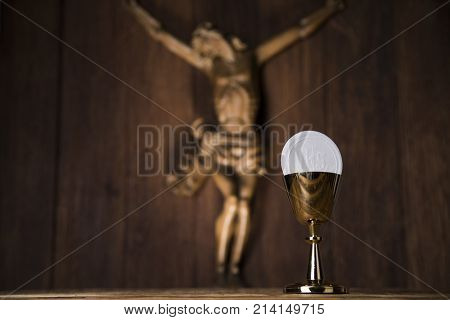 Eucharist symbol of bread and wine, chalice and host, First communion background