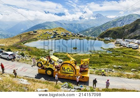 Col de la Croix de Fer France - 25 July 2015: Mc Cain caravan driving on the road to the Col de la Croix de Fer in Alps during the stage 20 of Le Tour de France 2015. Mc Cain is a market leader in frozen products made from potatoes.