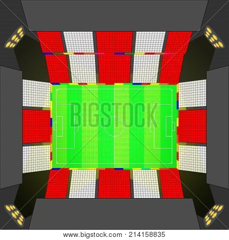 The football field and the stadium under the spotlights