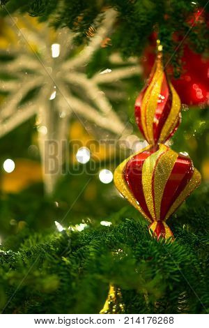 Multi-colored And Glitter Christmas Diamond Ornament Hang On Tree In Selective Focus