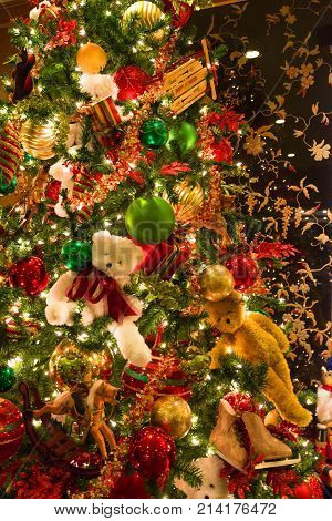 Christmas Texture. Colorful Ornaments Made Of Balls And Teddy Bears And Toys