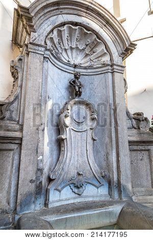 Brussels Belgium - July 6. 2017: Manneken Pis Statue In Brussels. Statue Of A Pissing Boy In A Beaut