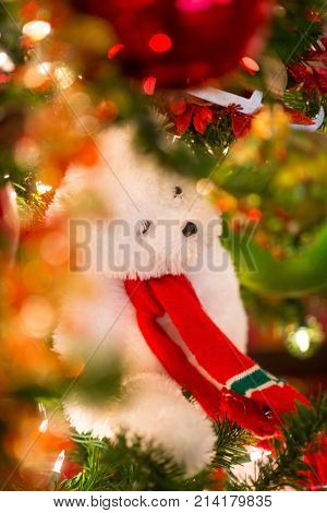 Christmas Background. Cute Teddy Bear Surrounded By Sparkling Christmas Ornaments