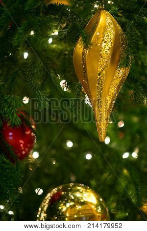 Christmas Background. Golden Ornament Diamon On The Green Of Christmas Tree