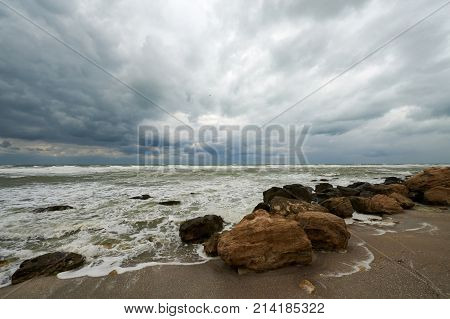 On the shore of the Caspian Sea. Caspian Sea in Kazakhstan.
The Caspian Sea is the largest enclosed inland body of water on Earth by area, variously classed as the world's largest lake or a full-fledged sea.