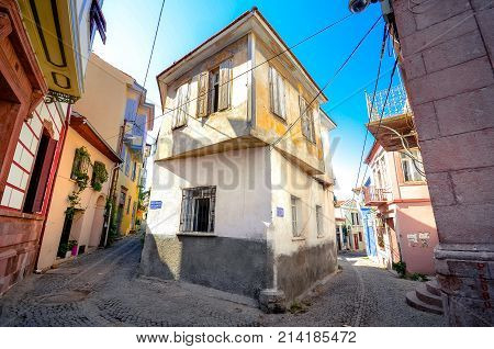 View of old streets with traditional houses at the town of Ayvalik, Turkey on August 19, 2015.