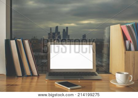Creative Workplace With Blank White Laptop