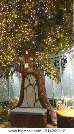 Sydney Australia - November 03 2017: Santa's greeting place at Whimsical garden covered in blooms and adorned with twinkling lights. Inside of Enchanted Garden pavilion in Queen Victoria Building.
